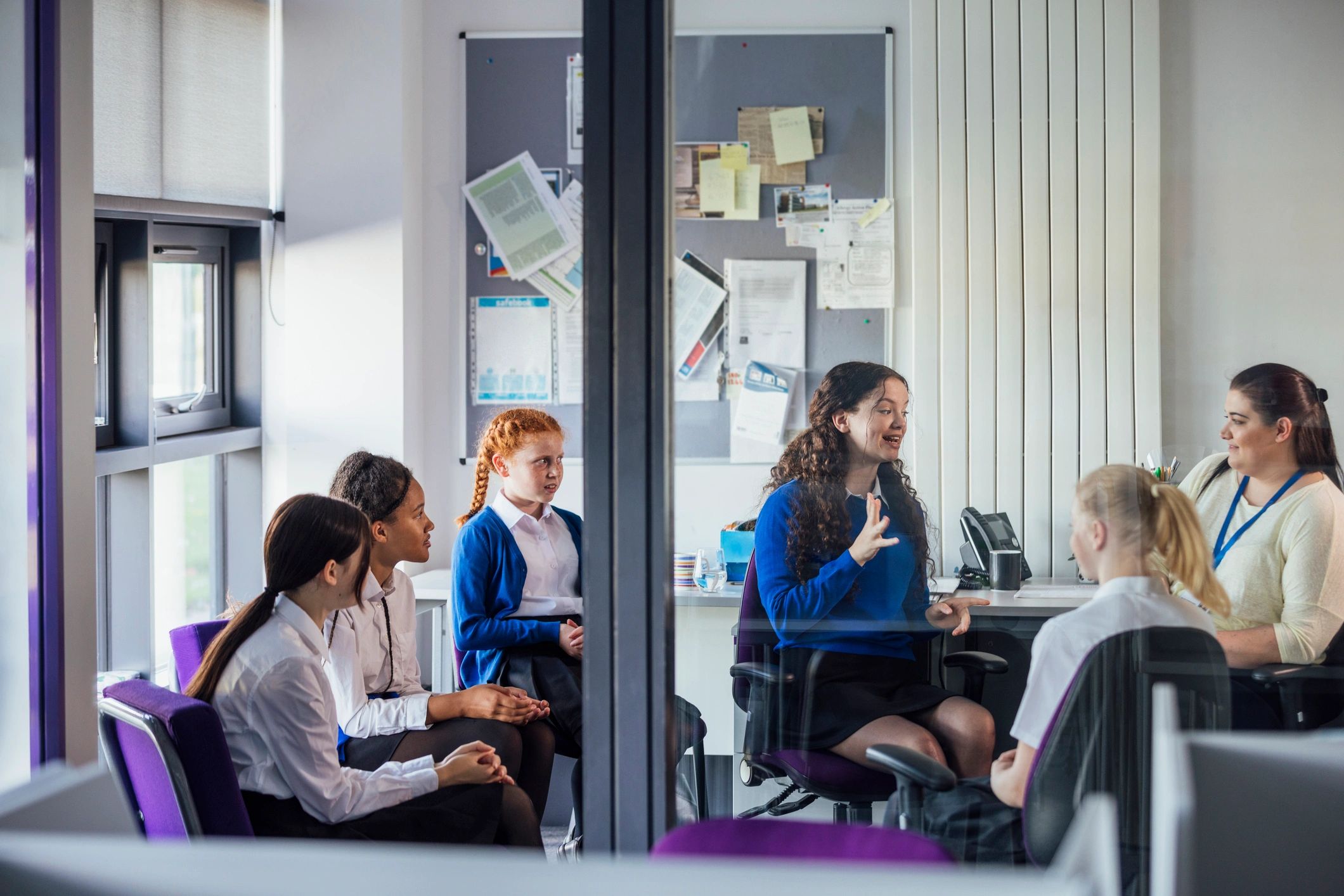 Students meeting with an educator during a learning consultation