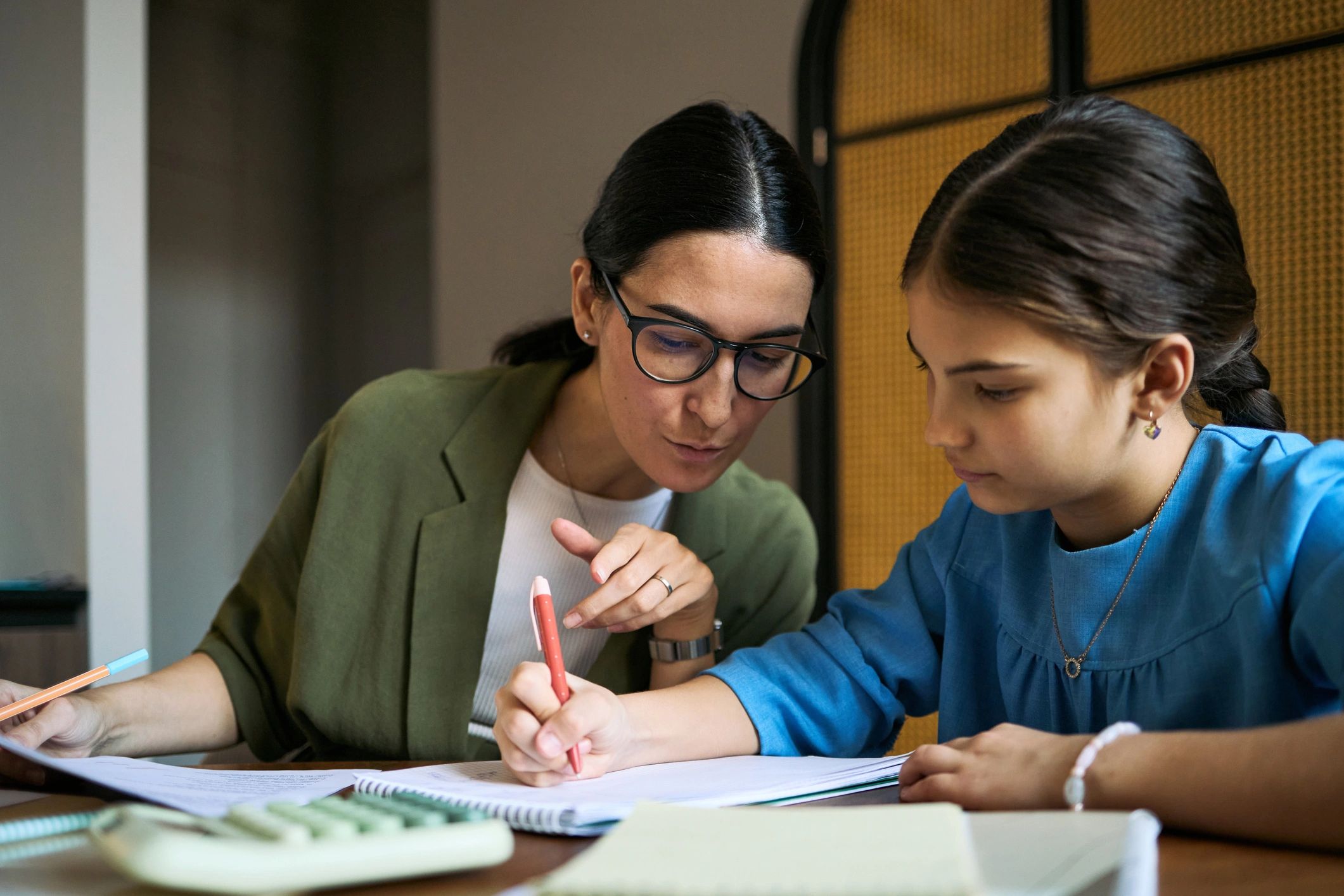 Educational therapist supporting a student during a learning session